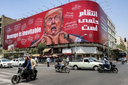 CARTAZ IRÃ TRUMP