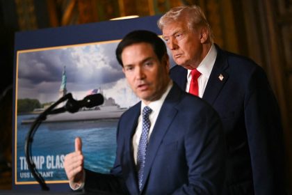 US President Donald Trump looks on as US Secretary of State Marco Rubio speaks about the US Navys new Golden Fleet initiative, unveiling a new class of warships, at Mar-a-Lago in Palm Beach, Florida, on December 22, 2025. President Donald Trump on December 22 announced a new class of heavily armed warships that will be named after himself -- an honor usually reserved for US leaders who have left office.
Two of the Trump-class ships will be built initially but that number could grow substantially in the future, according to the president, who said they will be "some of the most lethal surface warfare ships" and "the largest battleship in the history of our country."
Trump made the announcement at his Mar-a-Lago residence in Florida alongside Pentagon chief Pete Hegseth, Secretary of State Marco Rubio and Navy Secretary John Phelan, with images of the planned high-tech vessels on stands nearby. (Photo by ANDREW CABALLERO-REYNOLDS / AFP)
